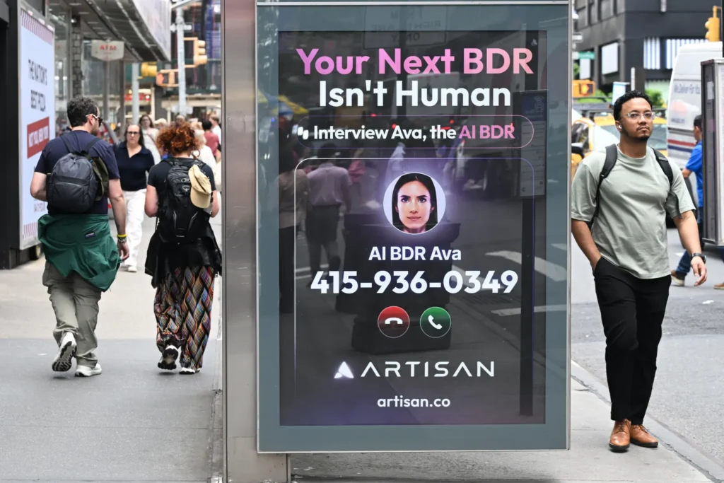 Artisan AI Times Square billboard with the phrase Stop Hiring Humans in 2025 campaign